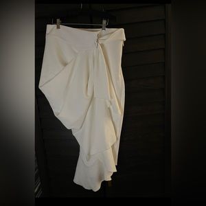 White Asymmetrical skirt with faux leather waistband and D-Ring belt.